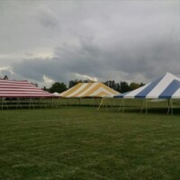 Red, Yellow, and Blue Striped Tents by Big T Tents
